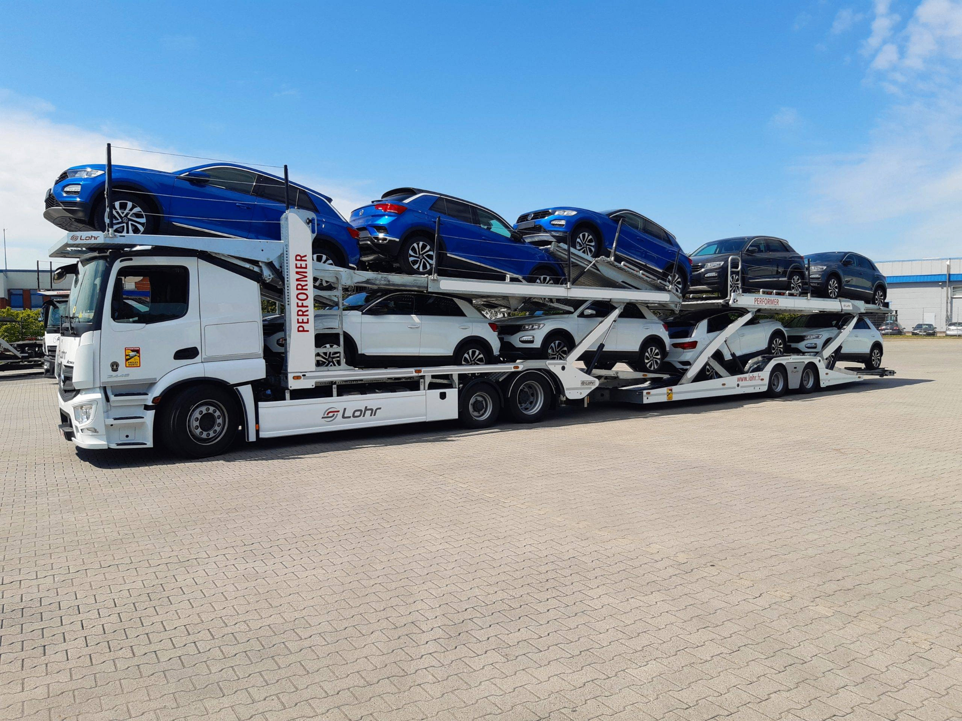 Car carrier truck loaded with vehicles on a European highway